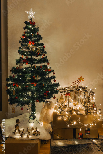 Handmade Wooden Christmas Nativity Scene with Lights and Pine Tree Festive Holiday Decor and Warm Wishes. High quality photo