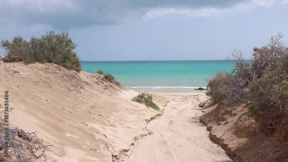 Entering a Beautiful Beach with a View of Azure Waters on Fuerteventura Island Spain in 4k Entering a Beautiful Beach with a View of Azure Waters on Fuerteventura Island Spain in 4k