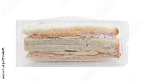 Ham sandwich in packaging isolated on white.