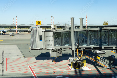 Modern airport ramp. Stationary terminal gates on airport runway