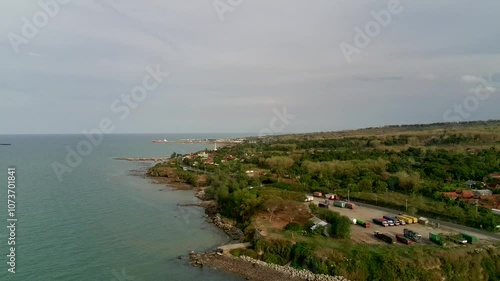 Aerial views of beautiful natural beaches and mountains. This place is located on the Pantura Sluke highway, Rembang. photo