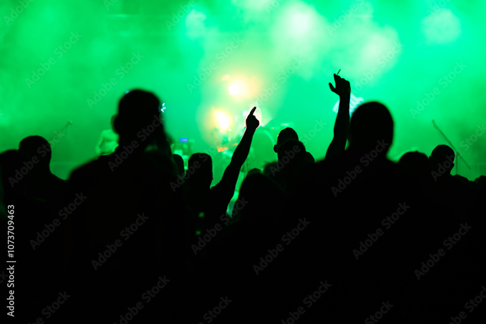 © erika8213 - Crowd at concert and colorful stage lights. © erika8213 - Crowd at concert and colorful stage lights.