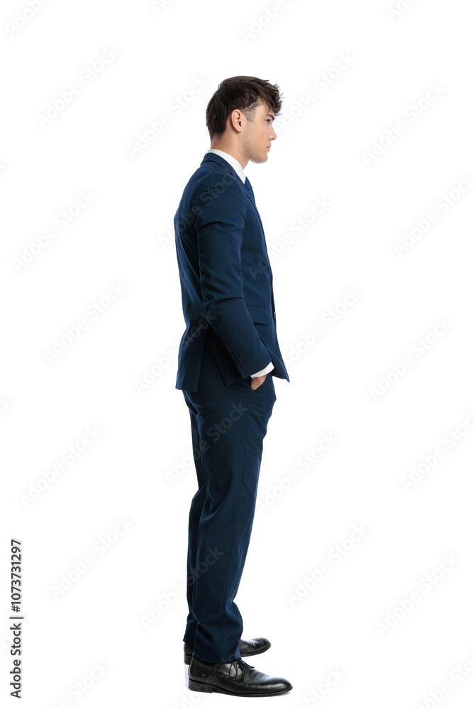 elegant businessman in navy blue suit standing in line elegant businessman in navy blue suit standing in line