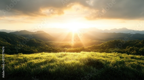 A beautiful sunrise casts a radiant glow across lush green valleys, with distant mountains in view, embodying hope, renewal, and the splendor of nature.