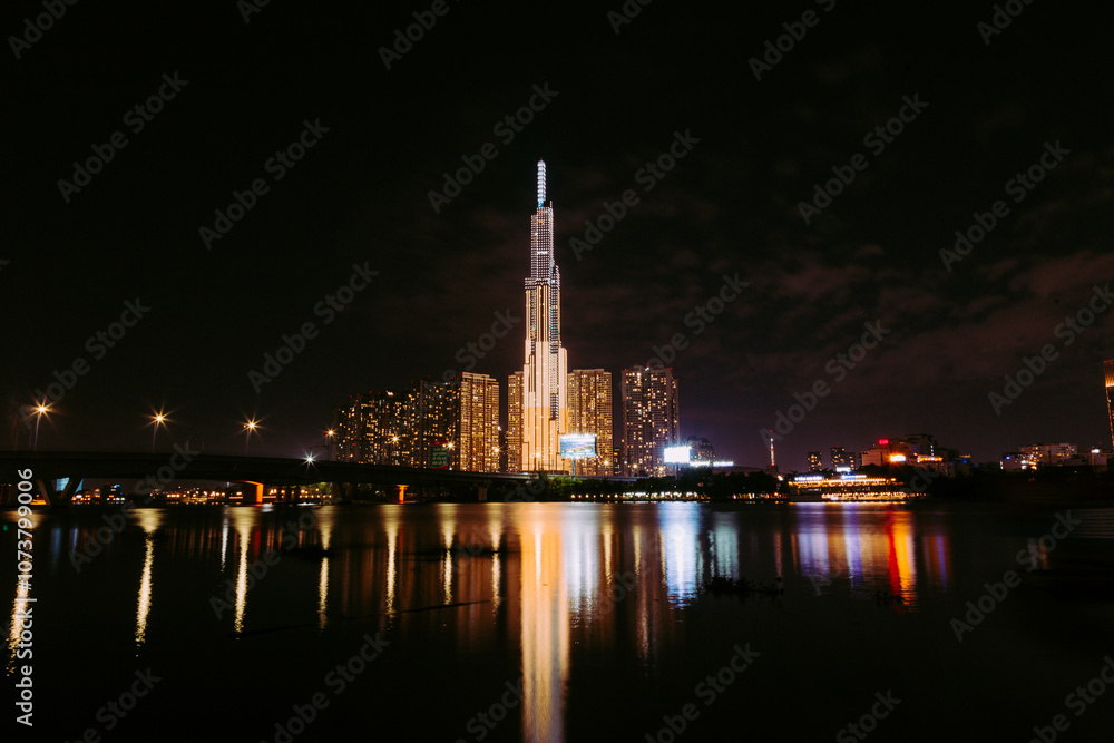 Bitexco and Landmark 81 at Sunset in Ho Chi Minh City with Saigon Bridge and Scenic View Bitexco and Landmark 81 at Sunset in Ho Chi Minh City with Saigon Bridge and Scenic View