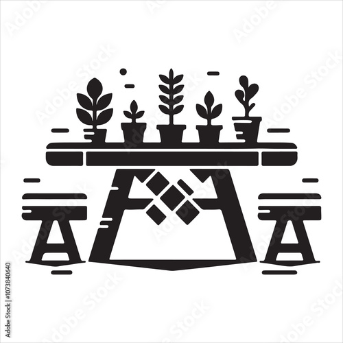 An illustration of a laptop and a plant in black and white