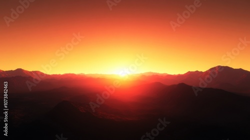 Breathtaking sunset over mountain peaks, radiating warm hues of orange and red in a serene landscape.