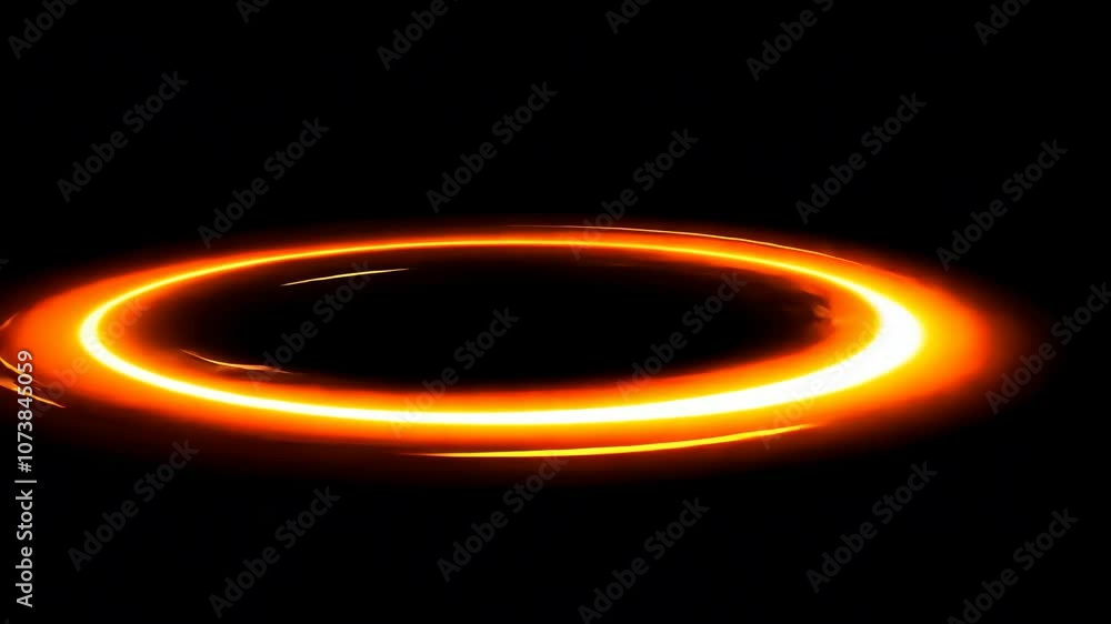 A glowing orange ring is visible in the darkness of space A glowing orange ring is visible in the darkness of space