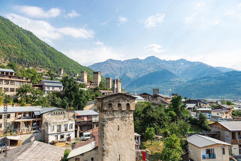 Mestia town in Georgia. The medieval Svan Towers is a traditional fortified residence in Mestia, Georgia. Svan towers and structures surrounded by green colors.