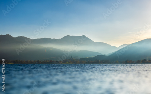 Sonne über den Bergen am Tegernsee photo