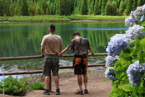 Brotherhood at the lake. Ideal landscape for adventure trips. Lagoa do Canario, Portugal, Azores Islands (Ilhas Açores, Oceano Atlântico)