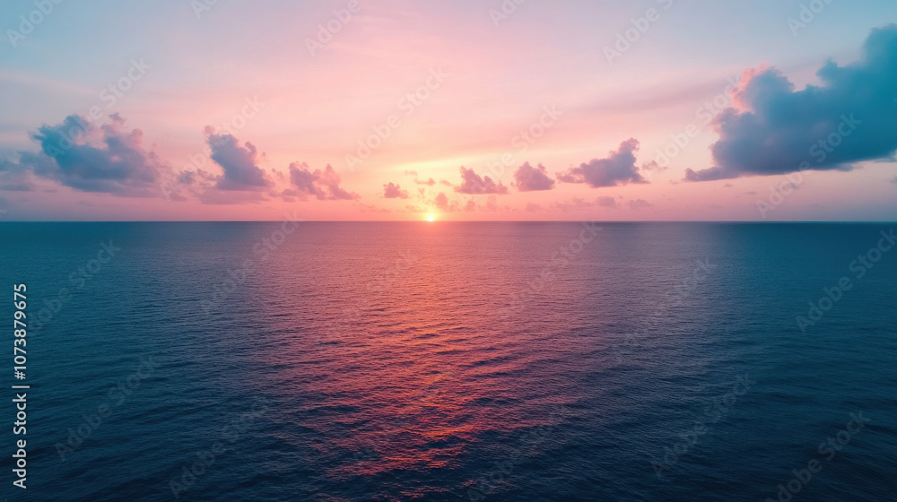 Obraz premium stunning sunset over calm ocean, with vibrant colors in sky