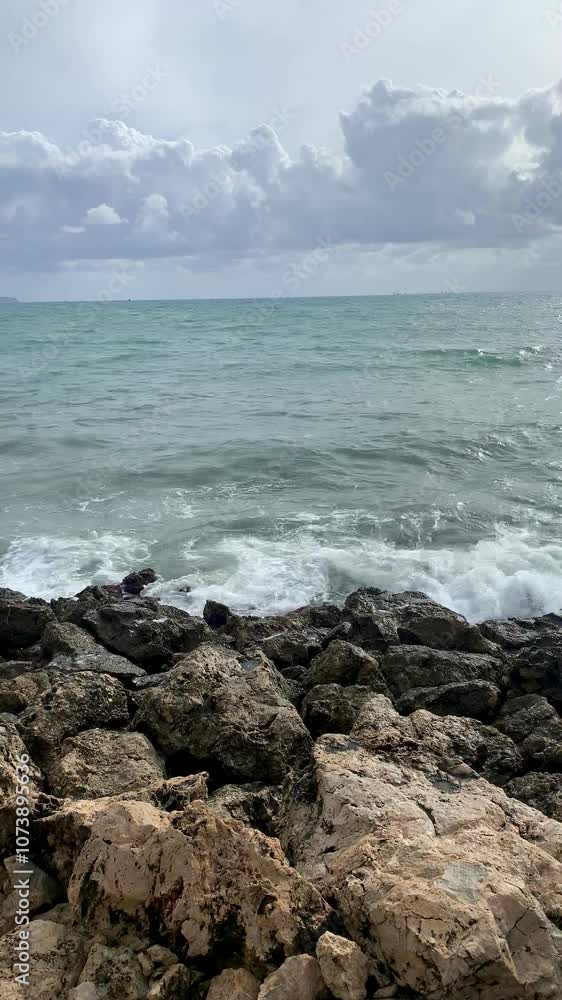 Vertical Video: Ocean Waves Crashing Against Rocks in Mallorca, Spain; Peaceful Nature Scene Vertical Video: Ocean Waves Crashing Against Rocks in Mallorca, Spain; Peaceful Nature Scene