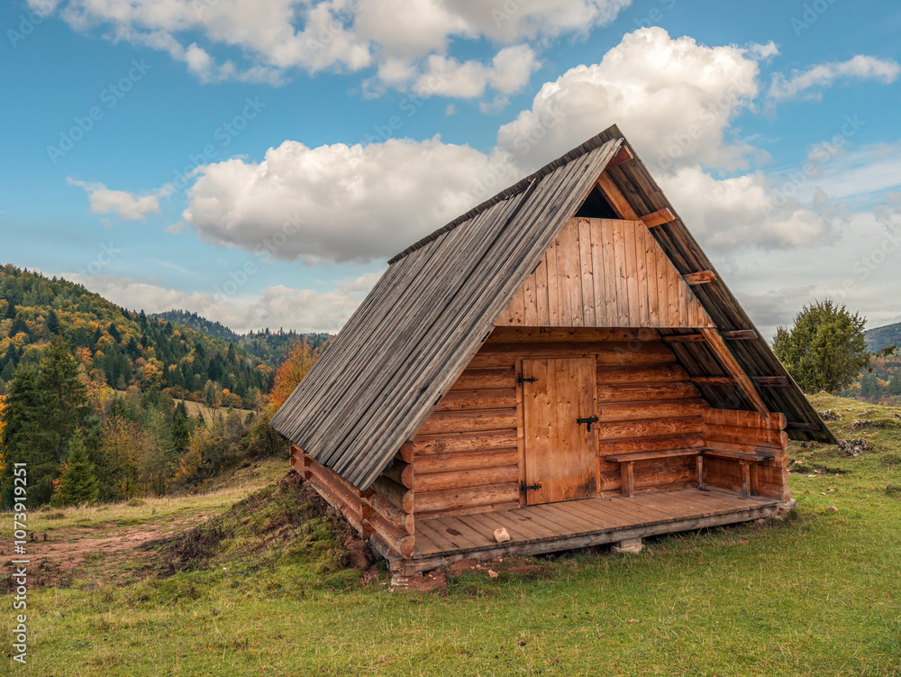 Rustic Wooden Shepherd's Hut in Tranquil Mountain Landscape Scene Rustic Wooden Shepherd's Hut in Tranquil Mountain Landscape Scene