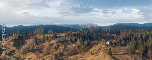 Picturesque morning above late autumn mountain countryside.  Ukraine, Carpathian Mountains. Peaceful traveling, seasonal, nature and countryside beauty concept scene.