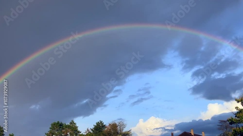 Two colorful rainbows in near plan