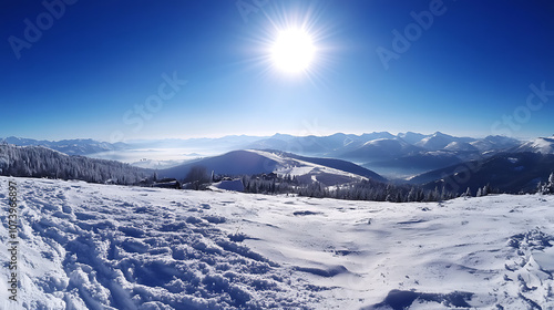 Beautiful panoramic view of the Carpathian mountains with the sun and blue sky, a panorama of the mountain landscape