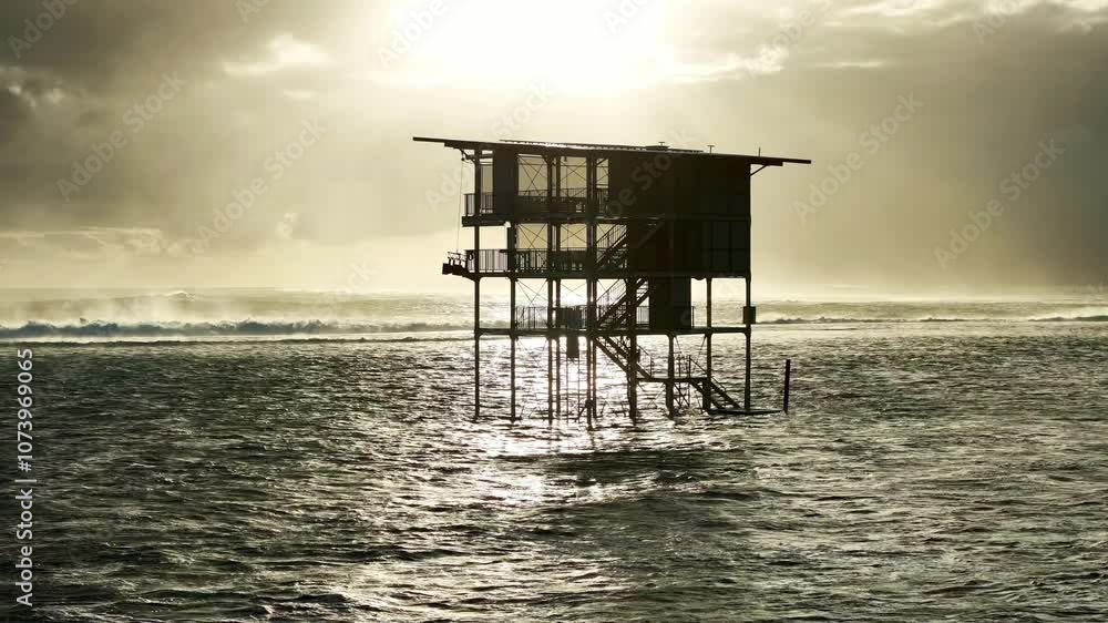 Drone Tahiti 4k. Tower for surf contest. Teahupoo famous surfing action sports destination in French Polynesia. Drone Tahiti 4k. Tower for surf contest. Teahupoo famous surfing action sports destination in French Polynesia.
