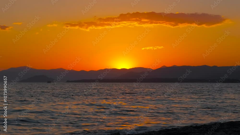 Alone lake bay with in nightfall. An alone lake place against orange horizon during evening time. Alone lake bay with in nightfall. An alone lake place against orange horizon during evening time.