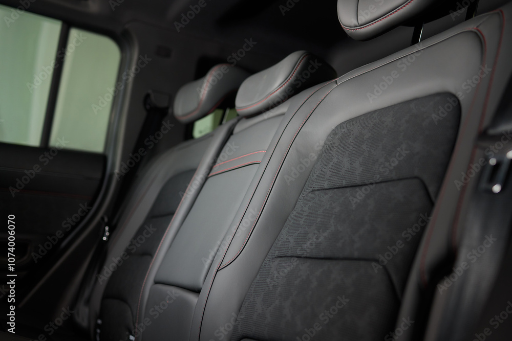 Car back seat with headrest and arm rest, a comfortable automotive fixture Car back seat with headrest and arm rest, a comfortable automotive fixture