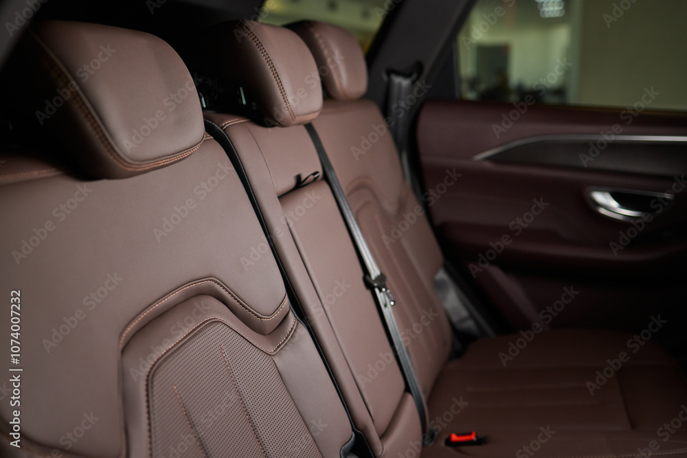 Car back seat with headrest and arm rest, a comfortable automotive fixture Car back seat with headrest and arm rest, a comfortable automotive fixture