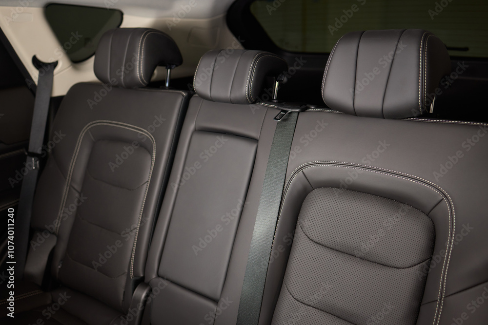 Fototapeta premium Car back seat with headrest and arm rest, a comfortable automotive fixture