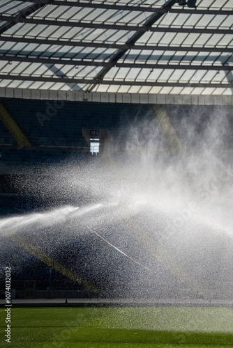 Obraz na płótnie watering the grass at the football stadium - Silesian Stadium - Poland w salonie