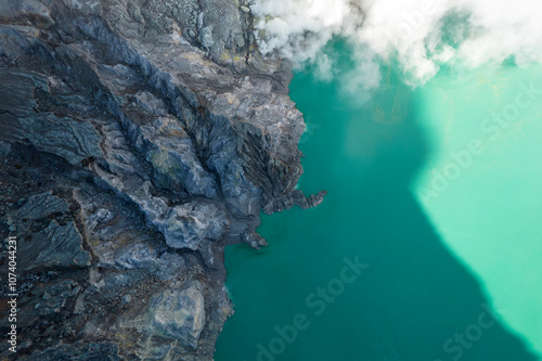 Kawah Ijen volcano crater lake in Banyuwangi is one of the best sights in Indonesia photo