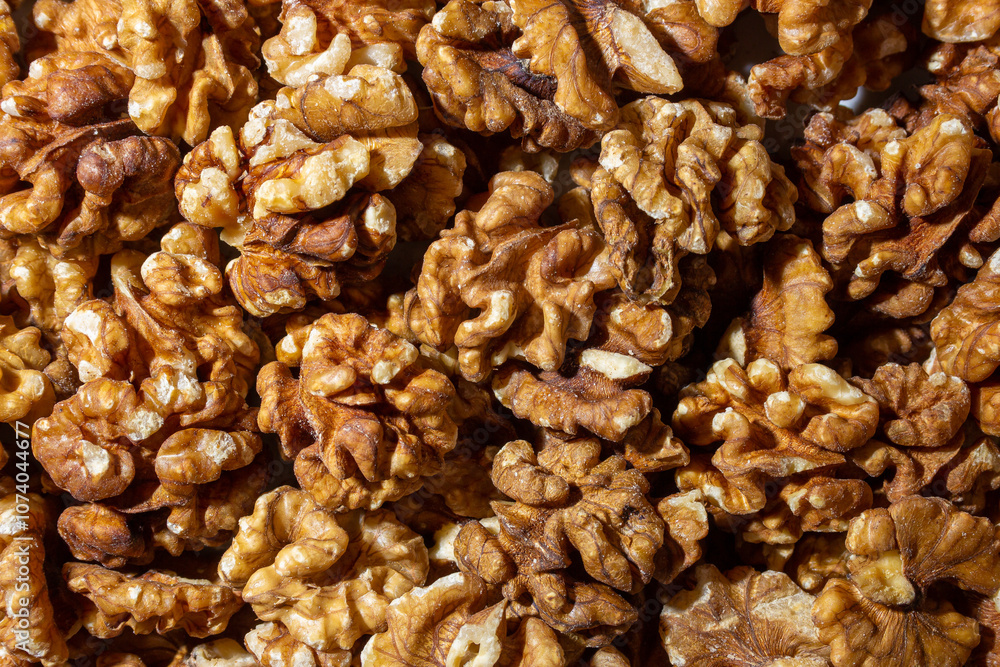 Scattered Shelled Walnuts. Background from Walnut. Natural High-Calorie Snacks Scattered Shelled Walnuts. Background from Walnut. Natural High-Calorie Snacks