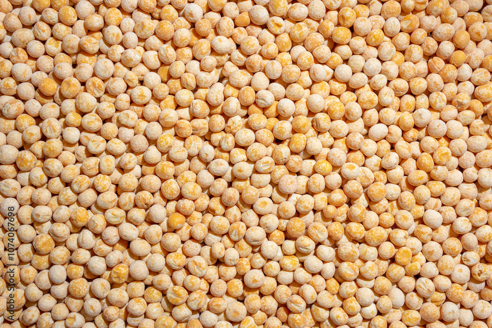 Uncooked Yellow Polished Peas Background. A Culinary Canvas of Dry Yellow Peas, Creating a Lively and Textured Background for Gourmet Cooking. Scattered Raw Polished Peas. Healthy Eating Ingredients Uncooked Yellow Polished Peas Background. A Culinary Canvas of Dry Yellow Peas, Creating a Lively and Textured Background for Gourmet Cooking. Scattered Raw Polished Peas. Healthy Eating Ingredients