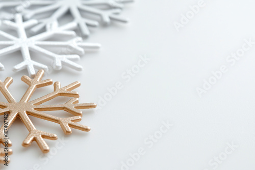 Intricate snowflake patterns in metallic colors create festive atmosphere.