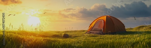 Wallpaper Mural A serene camping scene at sunset with an orange tent and grass. Torontodigital.ca