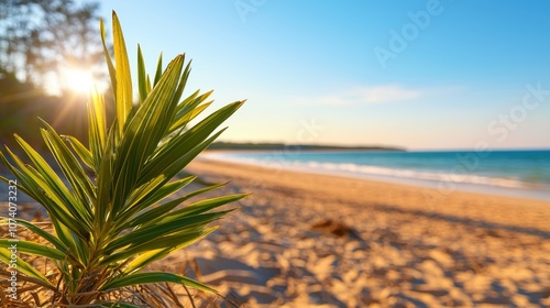 A serene beach scene with sunlight reflecting on the water, framed by lush green plants and soft sandy shores.