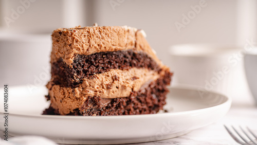 Chocolate Cake Slice on White Plate – Selective Focus