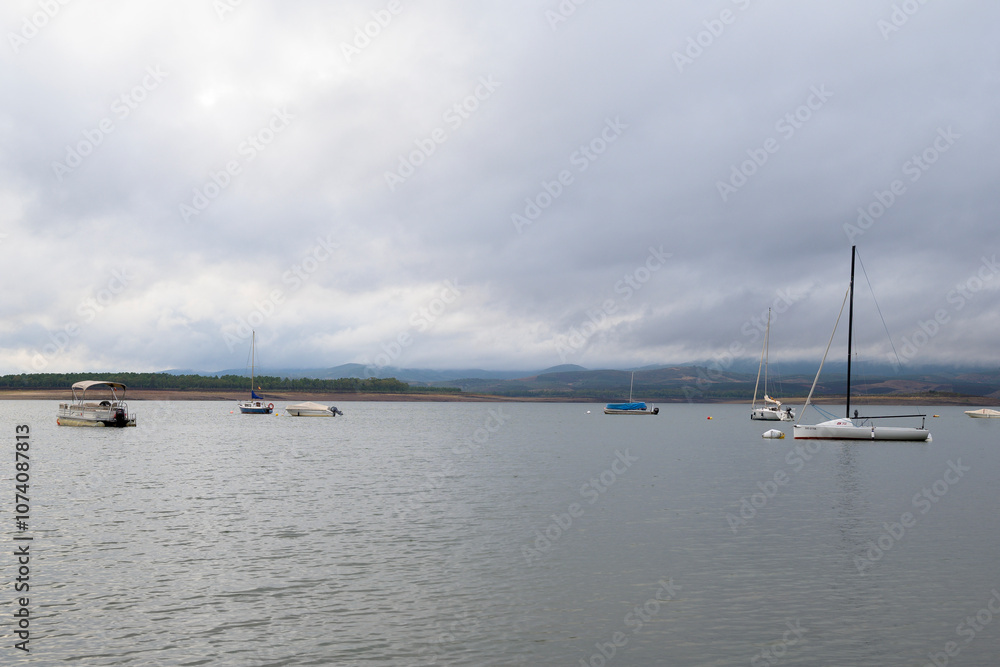 Navigable swamp with boats anchored due to bad weather horizontally Navigable swamp with boats anchored due to bad weather horizontally