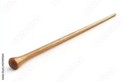 A solitary wooden magic wand on a white background