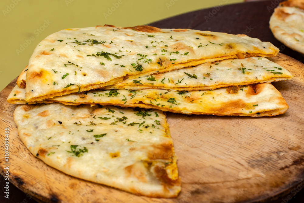 Closeup of Traditional Amritsari Masala Kulcha Cooked in Tandoor Closeup of Traditional Amritsari Masala Kulcha Cooked in Tandoor