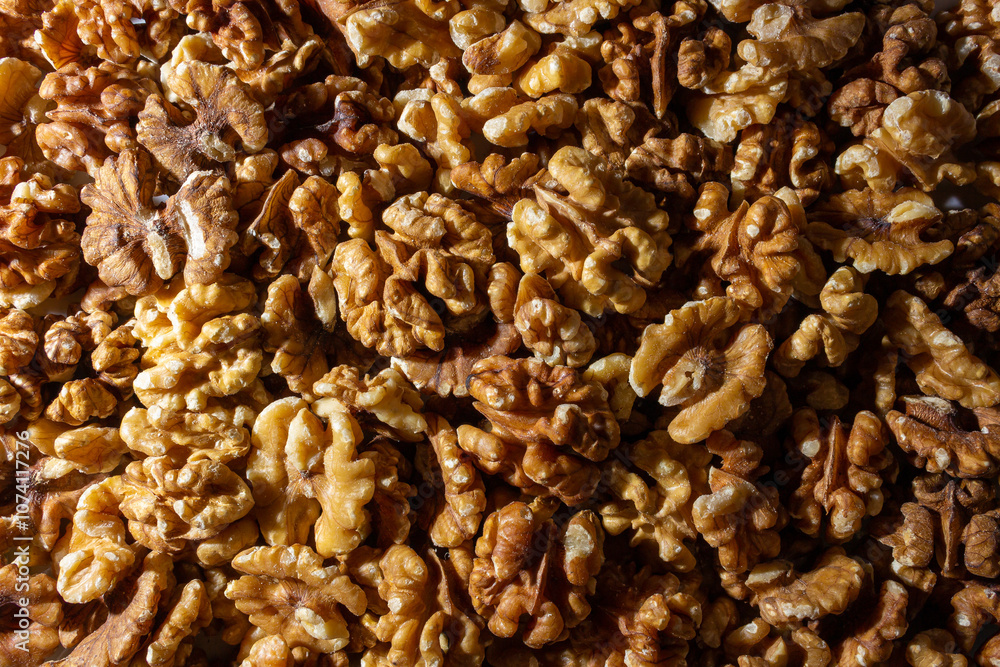 Scattered Shelled Walnuts. Background from Walnut. Natural High-Calorie Snacks Scattered Shelled Walnuts. Background from Walnut. Natural High-Calorie Snacks