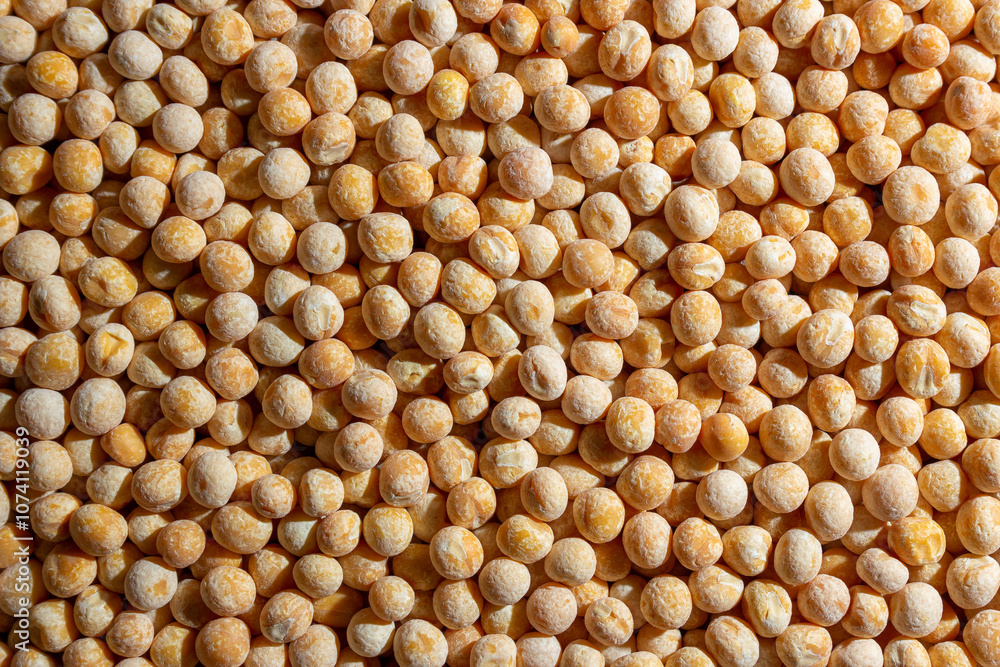 Uncooked Yellow Polished Peas Background. A Culinary Canvas of Dry Yellow Peas, Creating a Lively and Textured Background for Gourmet Cooking. Scattered Raw Polished Peas. Healthy Eating Ingredients Uncooked Yellow Polished Peas Background. A Culinary Canvas of Dry Yellow Peas, Creating a Lively and Textured Background for Gourmet Cooking. Scattered Raw Polished Peas. Healthy Eating Ingredients