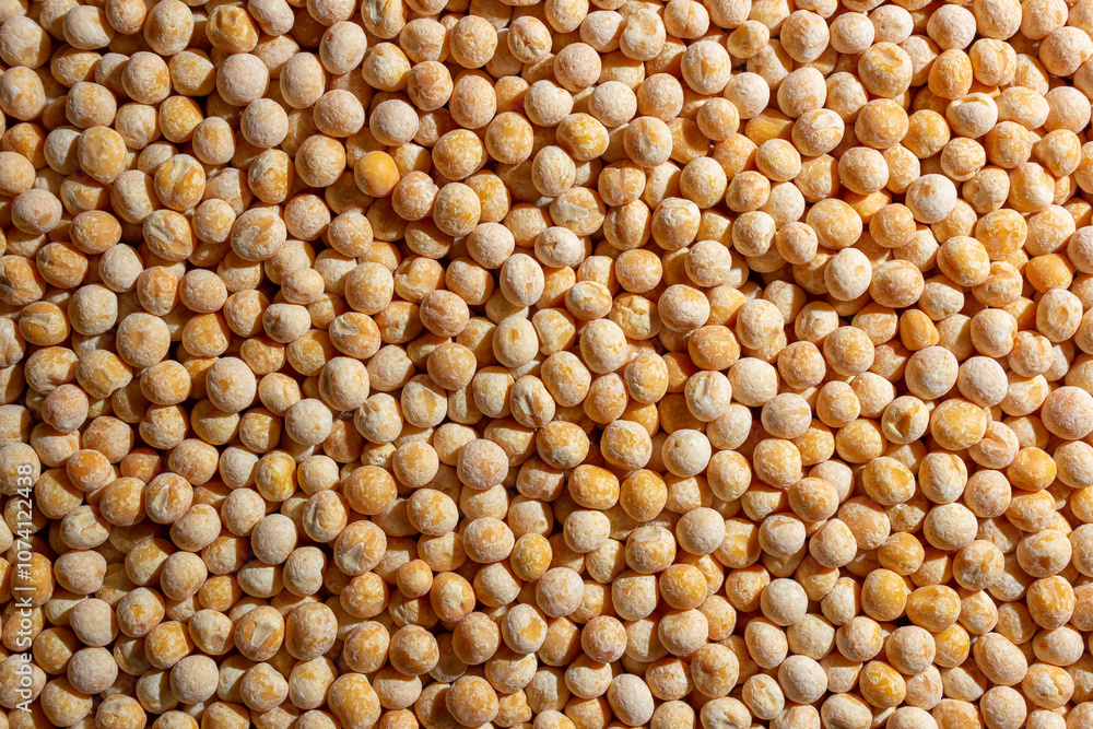 Uncooked Yellow Polished Peas Background. A Culinary Canvas of Dry Yellow Peas, Creating a Lively and Textured Background for Gourmet Cooking. Scattered Raw Polished Peas. Healthy Eating Ingredients Uncooked Yellow Polished Peas Background. A Culinary Canvas of Dry Yellow Peas, Creating a Lively and Textured Background for Gourmet Cooking. Scattered Raw Polished Peas. Healthy Eating Ingredients