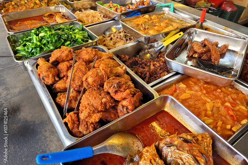 Assortment of Traditional Malaysian Dishes at a Food Stall