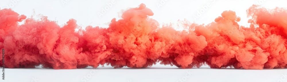 Fototapeta premium A vibrant display of red smoke creates a striking contrast against a light background, evoking a sense of drama and energy.