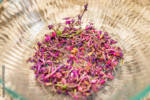 Dry willowherb herb fireweed purple flowers for tea plant called Ivan Chai in Russia with macro closeup view in bowl photo