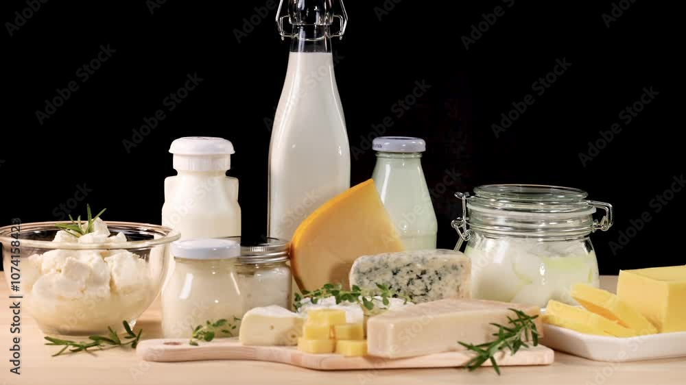 Dairy Products Display on Black Background Dairy Products Display on Black Background