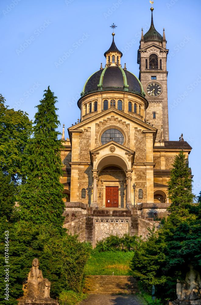 Obraz premium Zurich, Switzerland - July 26, 2024: The hilltop dome and tower of Kirche Enge in Zurich Switzerland 