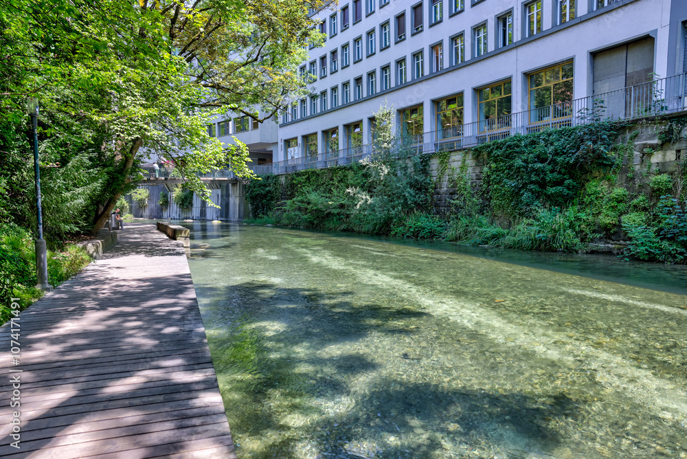 Obraz premium Zurich, Switzerland - July 26, 2024: \cenery along the Schanzengraben Promenade Zurich Switzerland 