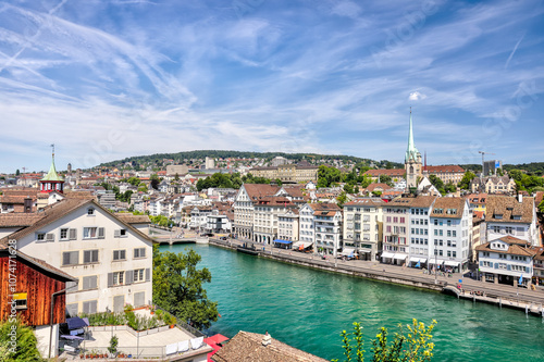 Zurich, Switzerland - July 26, 2024: The waterfront and old town at the mouth of the Limmat Riverl in Zurich Switzerland 