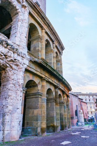 Preserved stone arcades of ancient Theatre of Marcellus in Rome, Italy photo