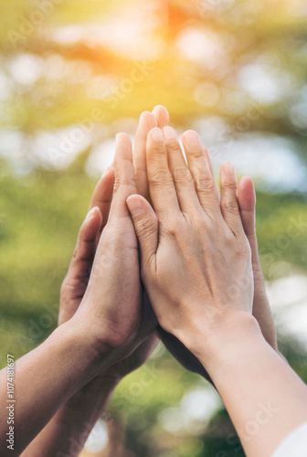 Vertical Horizon Group of teamwork high five team together hands raise up power partner. Diversity multiethnic business people hands success team together. Vertical Collaborate Volunteer partner win