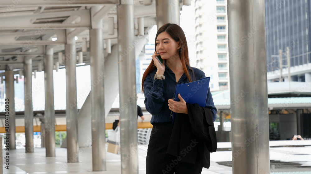 Business woman using smartphone shopping online, call, texting message internet technology lifestyle. Asian woman using cellphone walking on city street. Smart phone smart confident woman modern city Business woman using smartphone shopping online, call, texting message internet technology lifestyle. Asian woman using cellphone walking on city street. Smart phone smart confident woman modern city